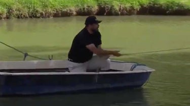 golfer rides in boat