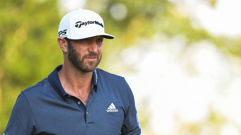 dustin johnson looks on at northern trust