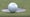 Rafael Cabrera-Bello's golf ball sits on edge of cup