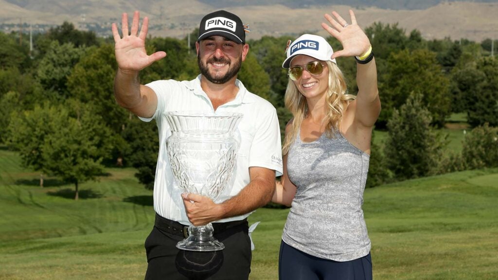 stephan jaeger with wife and trophy