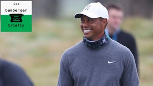 Tiger Woods smiles on Tuesday at the PGA Championship.