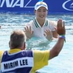 Mirim Lee and caddie