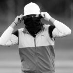 masked golfer