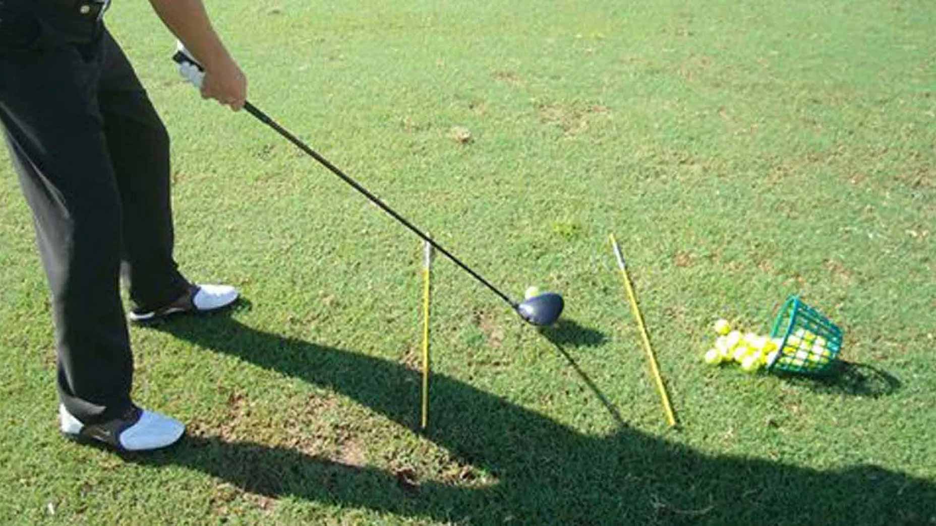 How to properly use alignment sticks when practicing