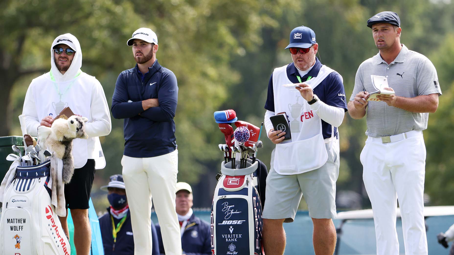 bryson dechambeau and matthew wolff look on winged foot