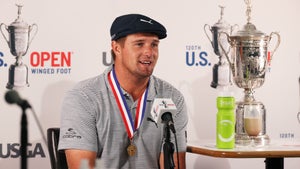 Bryson DeChambeau enjoying a glass of chocolate milk in his post-round press conference.