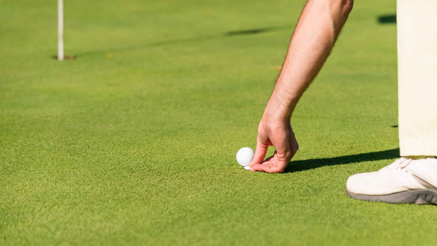 Marking Golf Ball Position At The Green Focus On Marker Stock