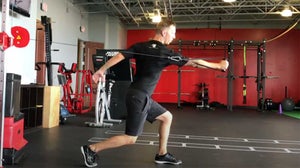 The single-arm split-stance cable press is a great way to train your golf swing in the gym.