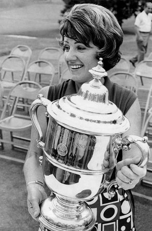 Susie Berning handles the U.S. Women’s Open hardware in 1972, as she would a year later at the CC of Rochester.