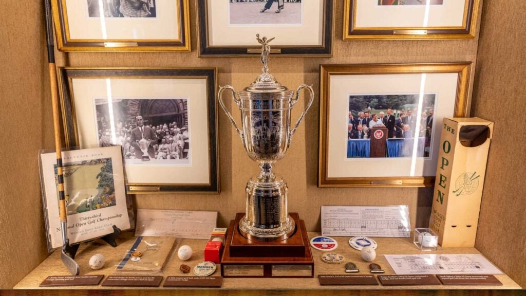 U.S. Open trophies, tournament-used gear, vintage merchandise and more are on display in the Winged Foot Clubhouse.