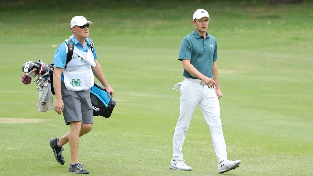 Jordan Spieth (right) had his father Shawn (left) caddie for him at the 2019 WGC-Mexico Championship.