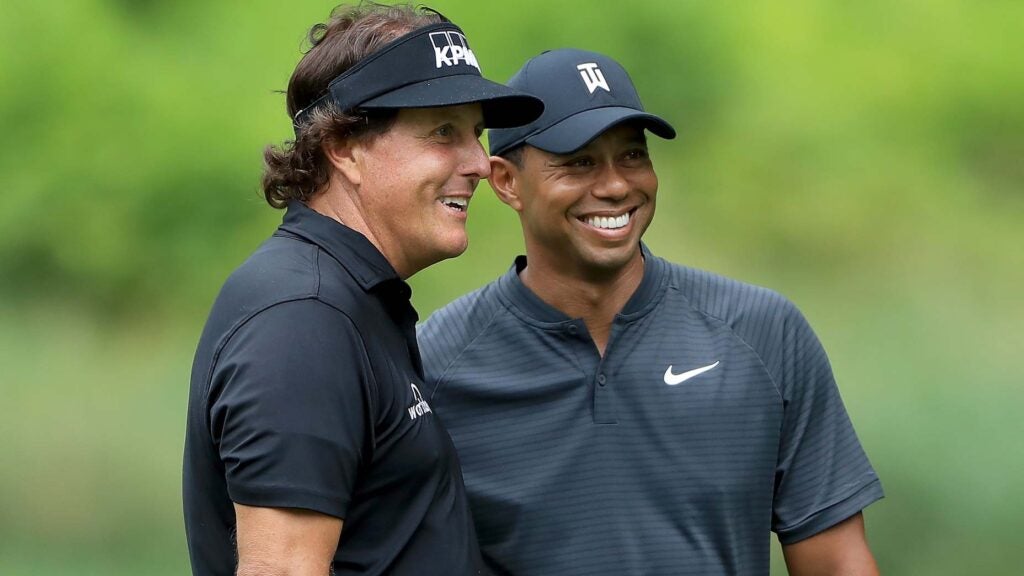 tiger woods and phil mickelson laugh
