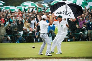 Steve Williams and Adam Scott celebrate Scott's 2011 Masters victory.