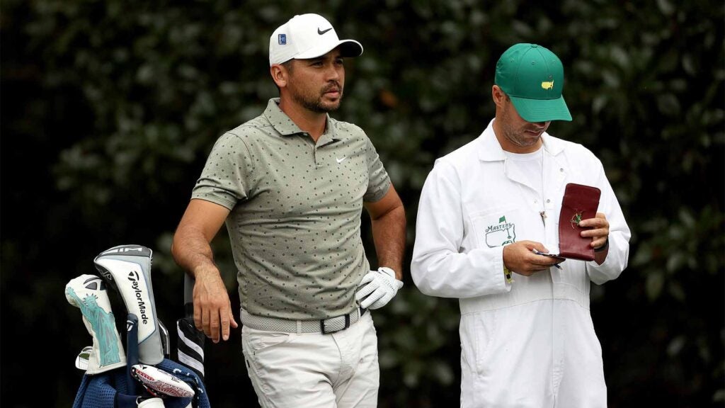 Jason Day looks over a shot at the 2020 Masters.