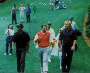 Tiger Woods and Greg Norman at the 1997 Masters.