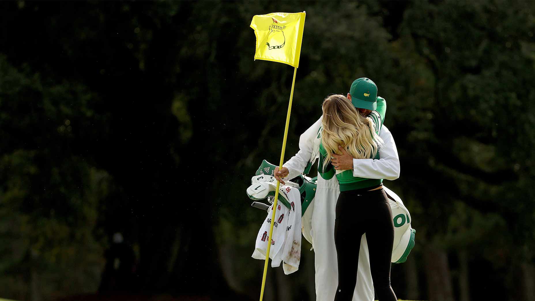 Paulina Gretzky hugs Austin Johnson.