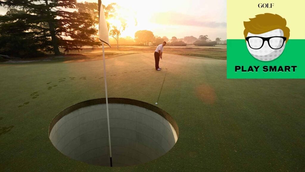 Golfer putting on golf course to giant hole