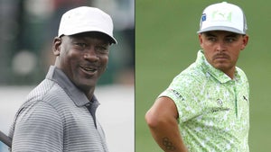 Michael Jordan and Rickie Fowler on the golf course.