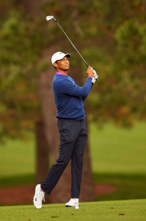 tiger woods swings iron masters