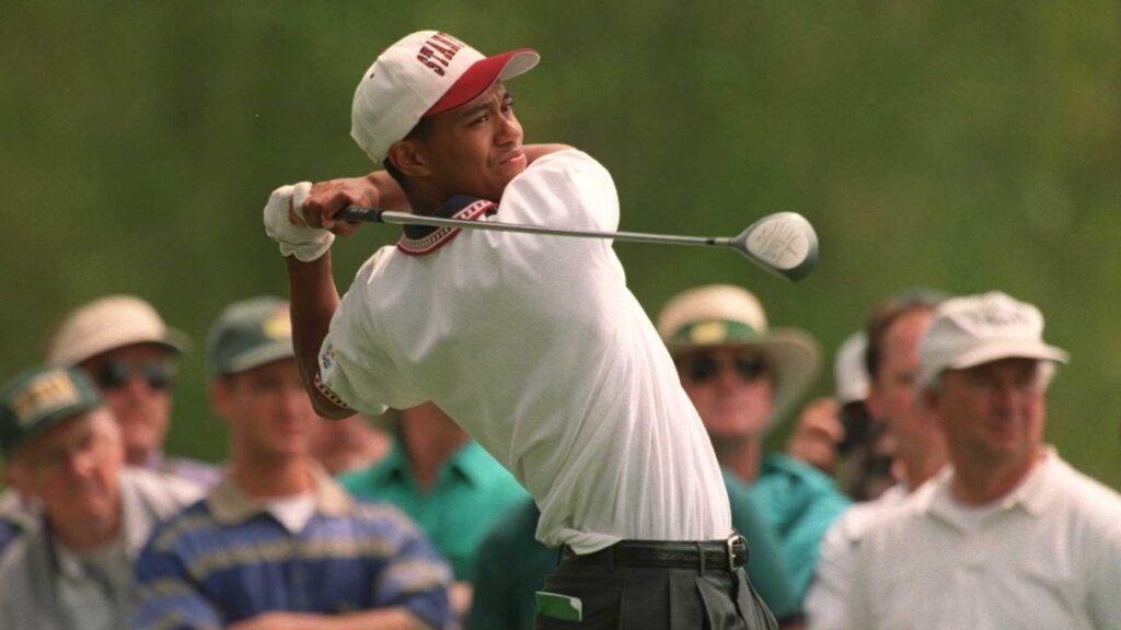 Tiger Woods tees off during a practice round prior to the 1995 Masters.