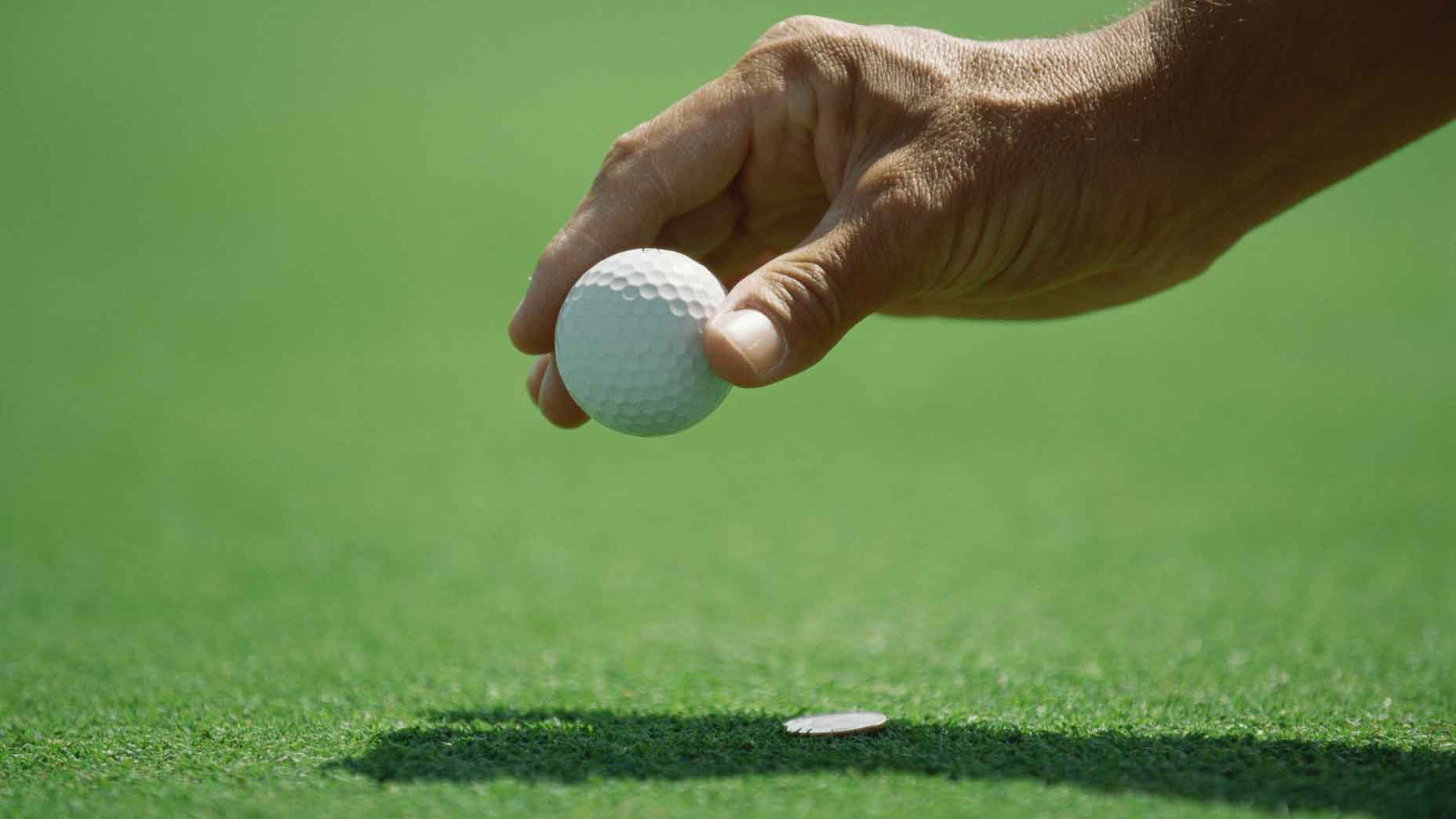 Marking Golf Ball Position At The Green Focus On Marker Stock