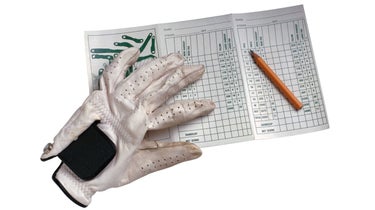 golf scorecard and glove