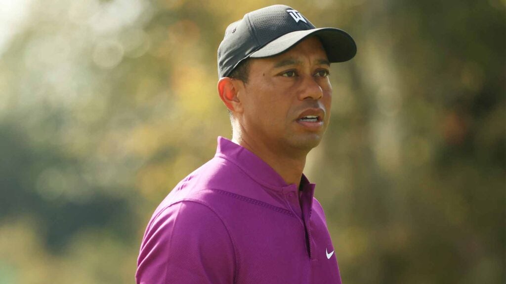 tiger woods looks off in distance