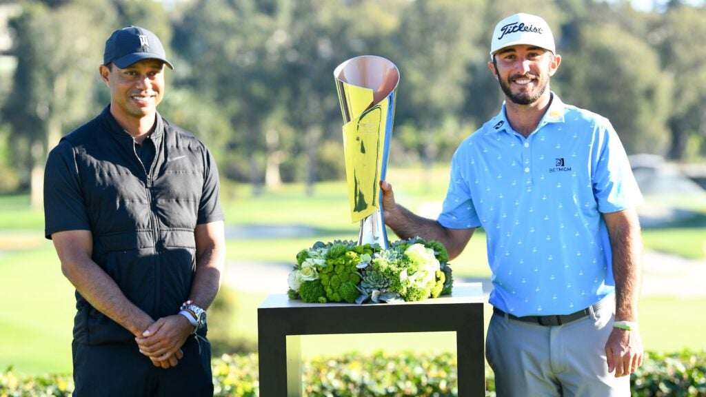 Tiger Woods presented Max Homa with the Genesis Invitational trophy on Sunday.