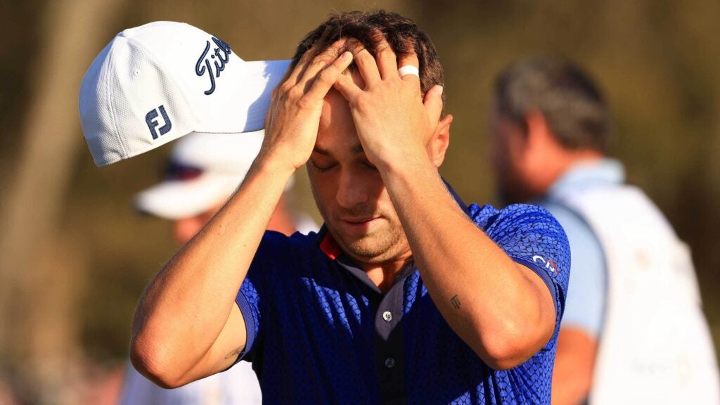 justin thomas with hands on his head