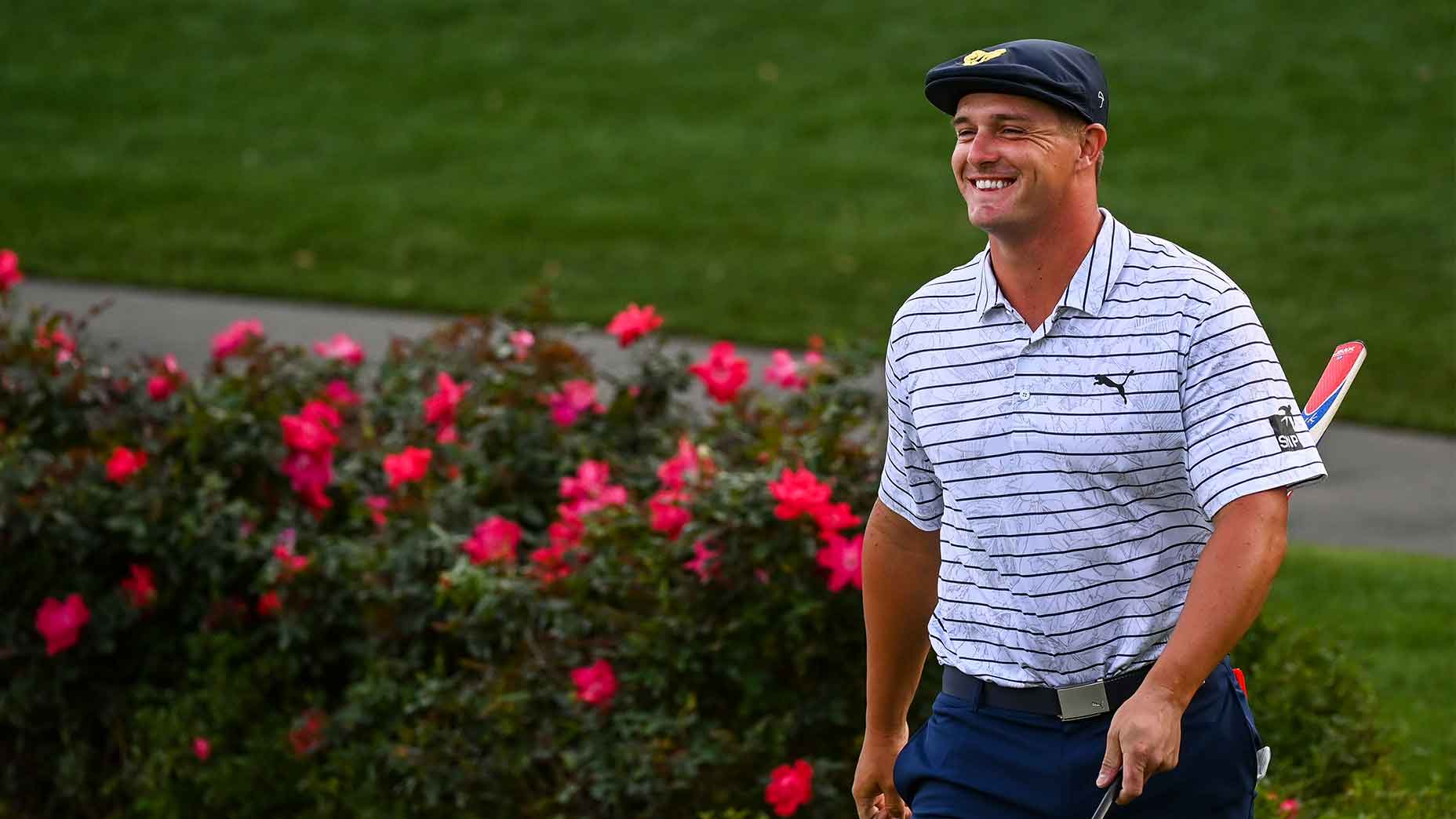 bryson dechambeau smiles camera