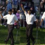 tiger woods celebrates putt players championship