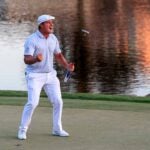 Bryson DeChambeau celebrates his victory on the 18th green at Bay Hill.