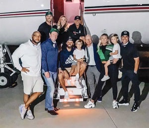 Team DJ beamed after the big man’s 2020 Masters win. The posse included (clockwise from top left) Johnson’s brother and caddie, Austin; Janet Gretzky; trainer Joey Diovisalvi; coach Claude Harmon III; Paulina and son River; agent David Winkle; Johnson and son Tatum; Wayne Gretzky; and personal chef Michael Parks.