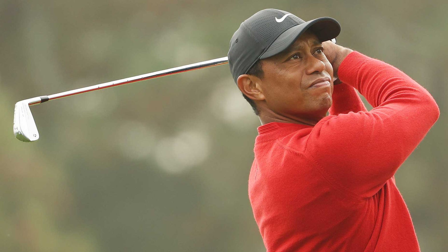 Is Tiger Woods doing work on his backyard practice facility?