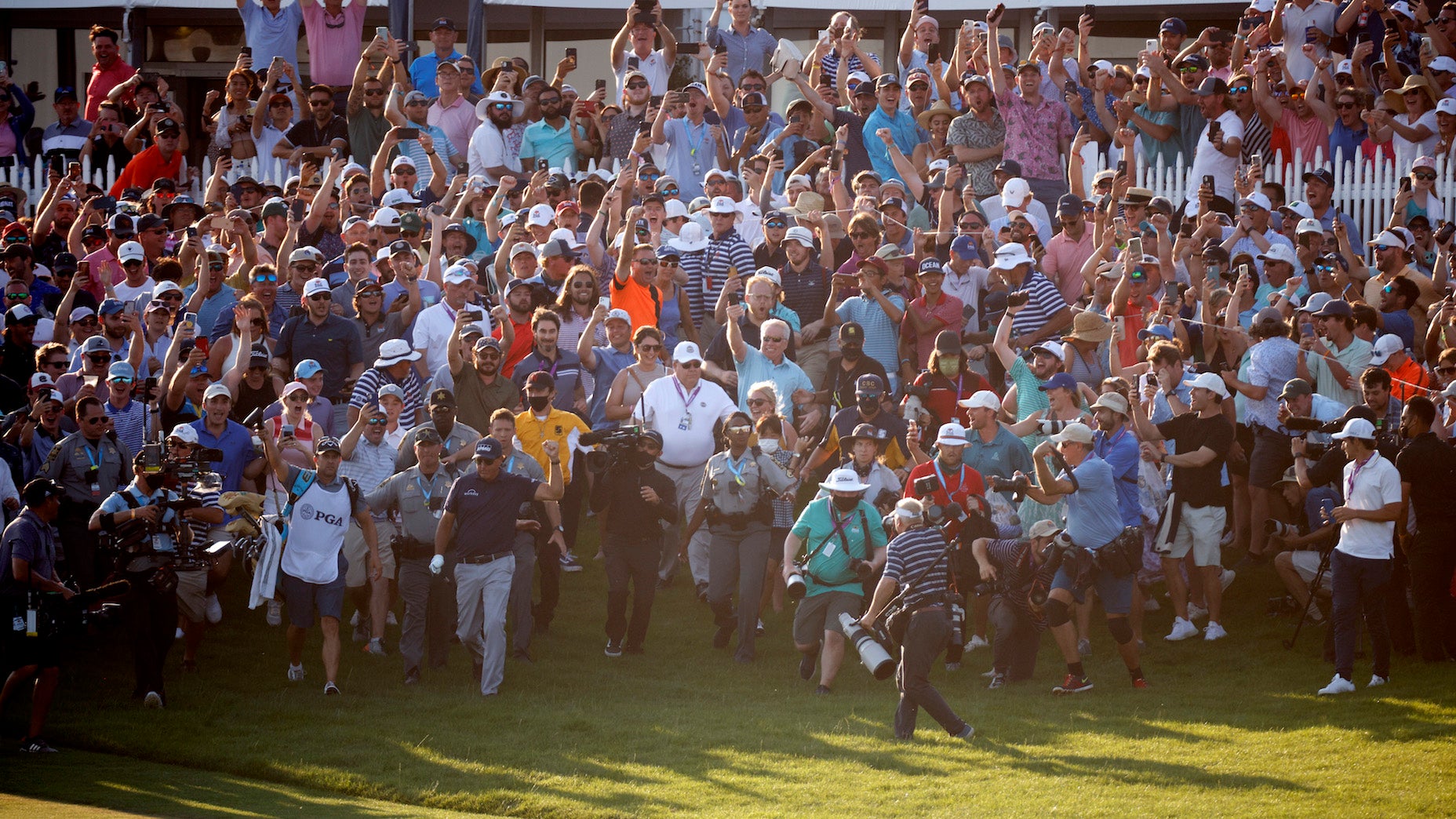 What it was like amid the 18th-hole chaos of Phil Mickelson's historic