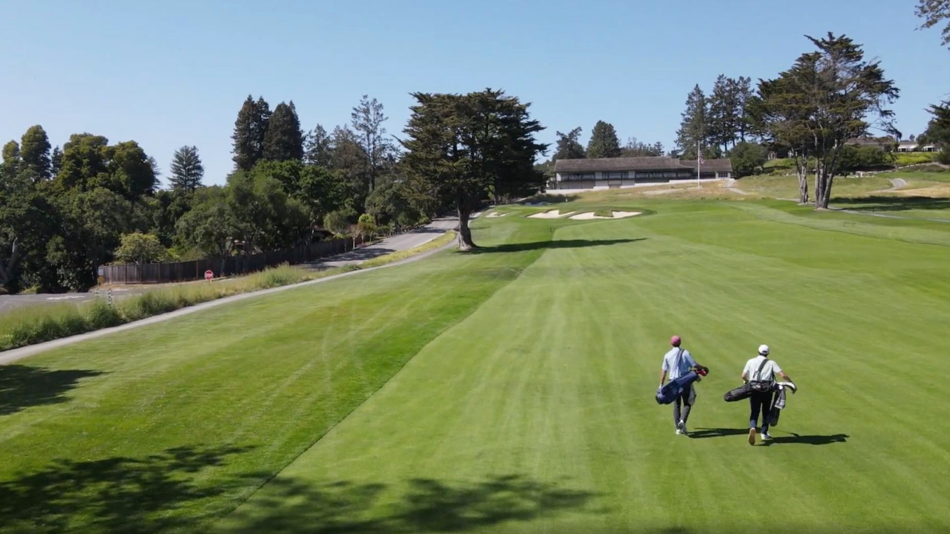 Dylan Dethier and Sean Zak walking up No. 9 at Pasatiempo.