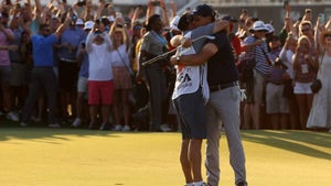 phil mickelson hugs his brother