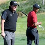 tiger woods and phil mickelson smile