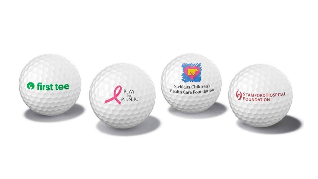 golf balls with charity logos