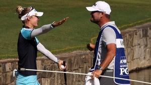 Nelly Korda and her caddie Jason McDede celebrated on the 18th green.