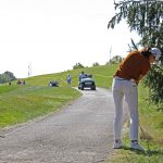 golfer located cart path