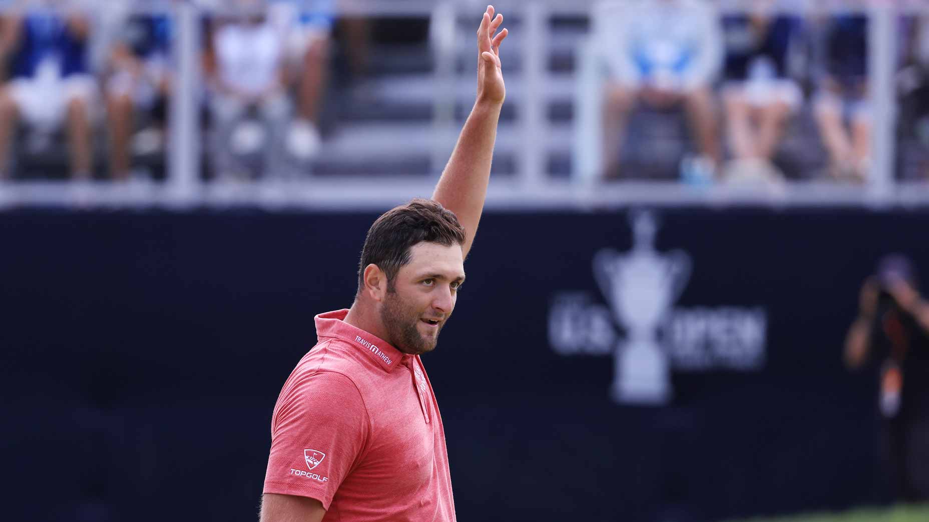 jon rahm waves to the fans