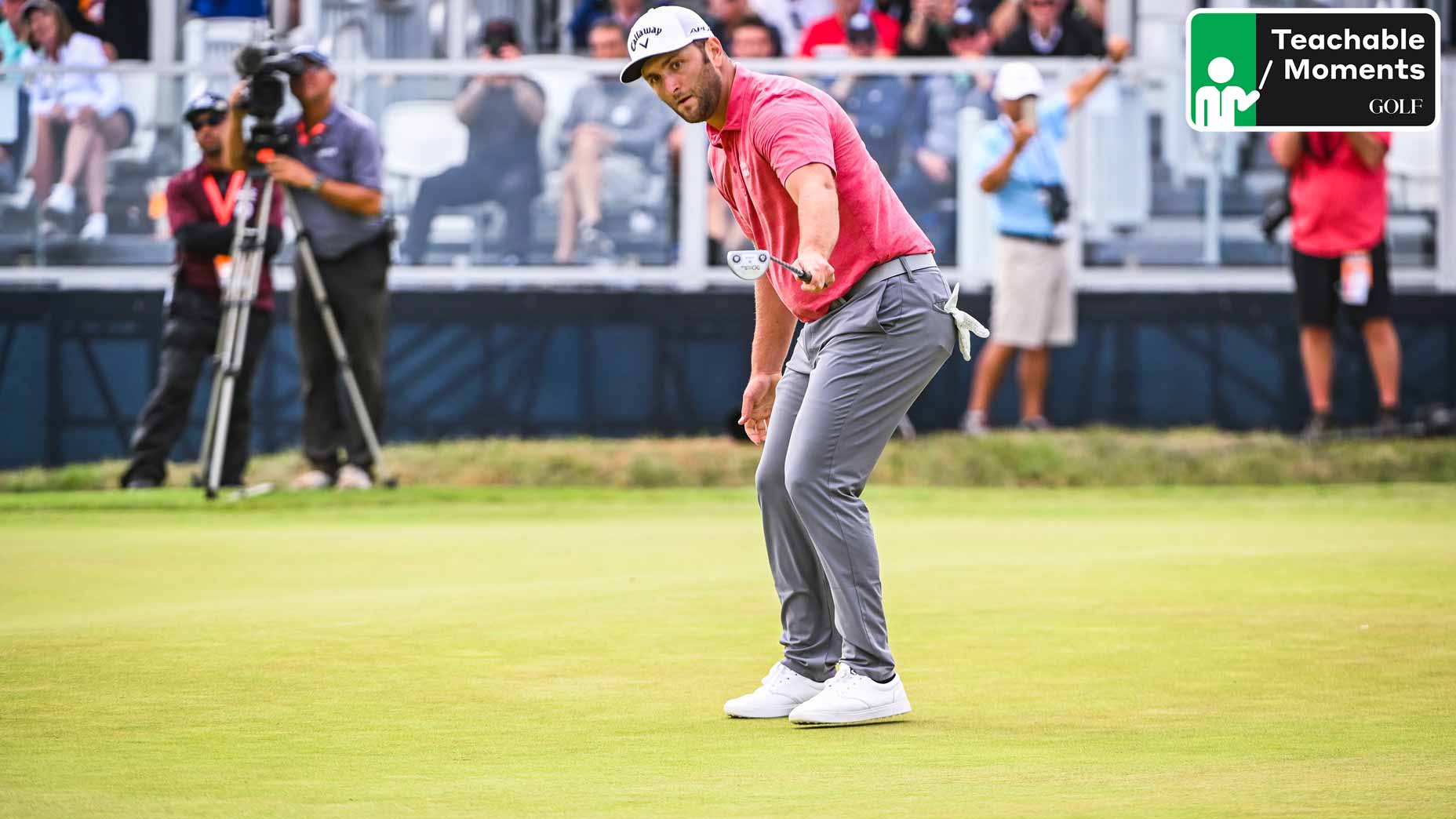 jon rahm lifts arm