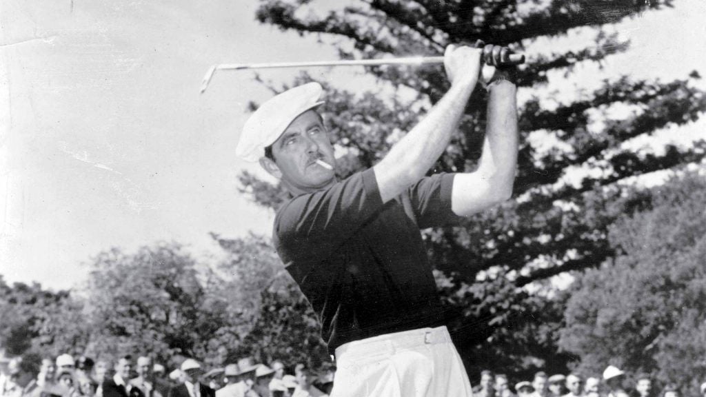 Lloyd Mangrum, winner of the 1946 U.S. Open Championship, hits a shot.