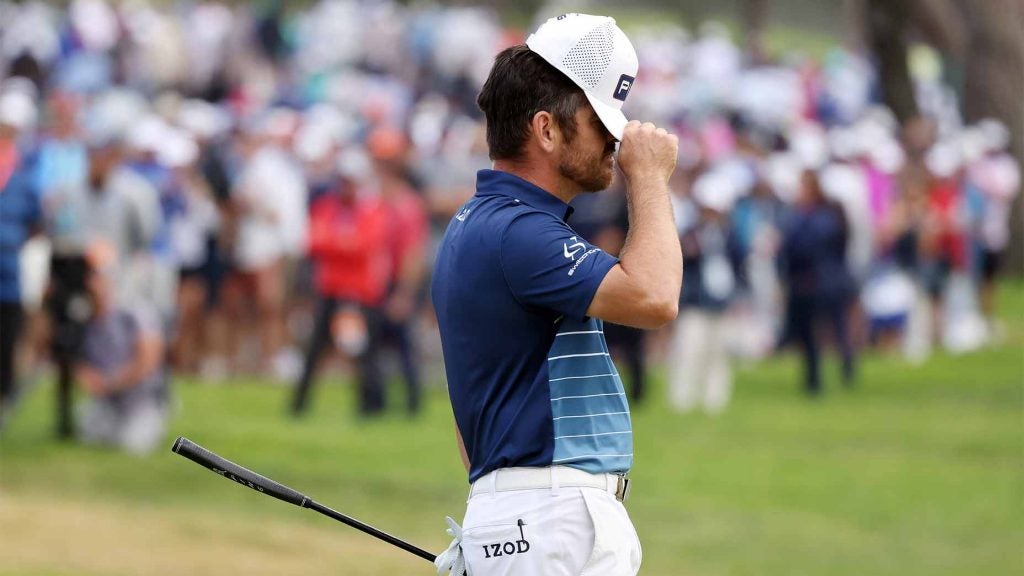 Louie Oosthuizen fixes his hat at the us open.