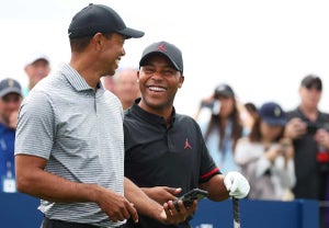 Tiger Woods and Harold Varner at the 2019 Players Championship.