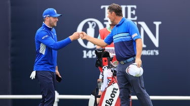 Padraig Harrington and Sam Forgan on the first tee at the Open Championship.