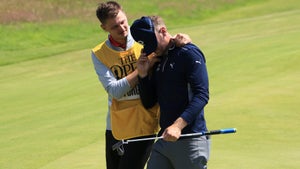Sam Forgan, consoled by his caddie on the 18th green on Friday at Royal St. George's.