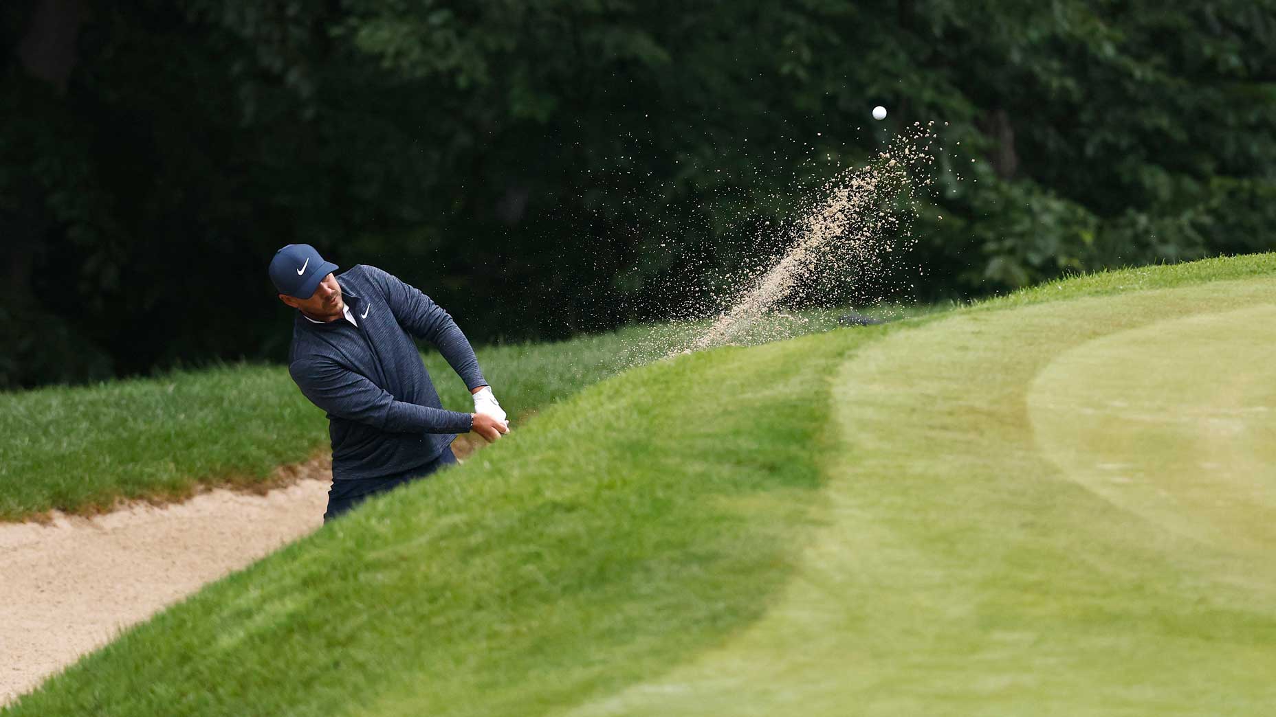 brooks koepka hits bunker shot