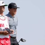 cameron champ with his caddie